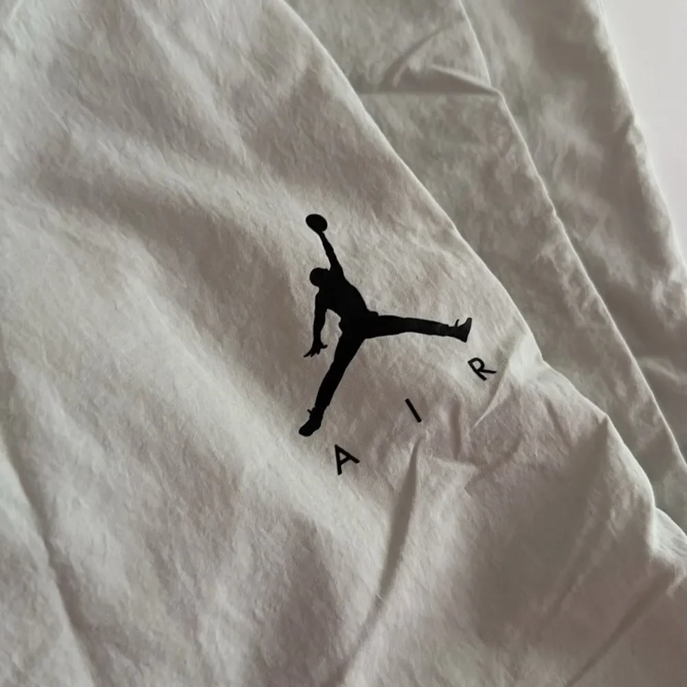 Jordan Cream Sweatpants with Jumpman Logo and Elastic Waistband